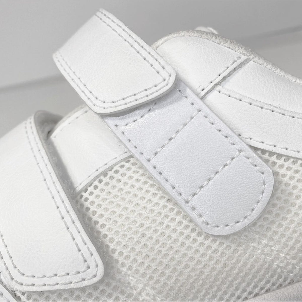 Strap extension attached to Velcro shoe
